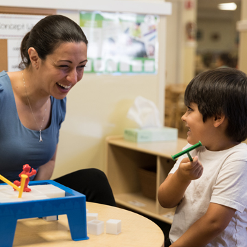 teacher working with kid