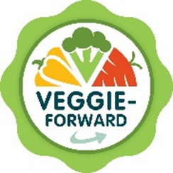 A green badge-style logo with a scalloped outer edge and a white center featuring stylized vegetables (carrot, broccoli, and pepper) above the words “VEGGIE-FORWARD” in bold lettering.